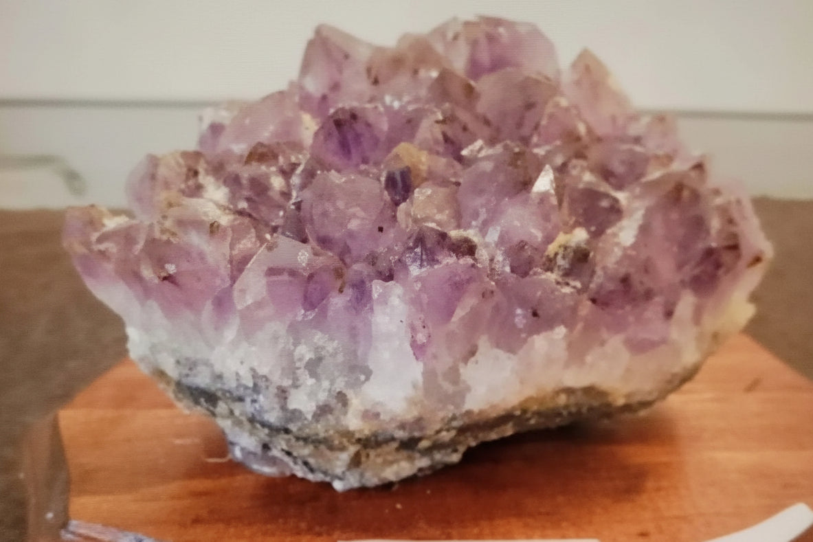Amethyst,large piece on Wooden Base